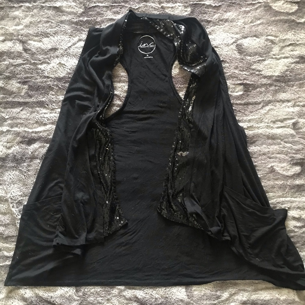 Sleeveless black cardigan with sequin detail